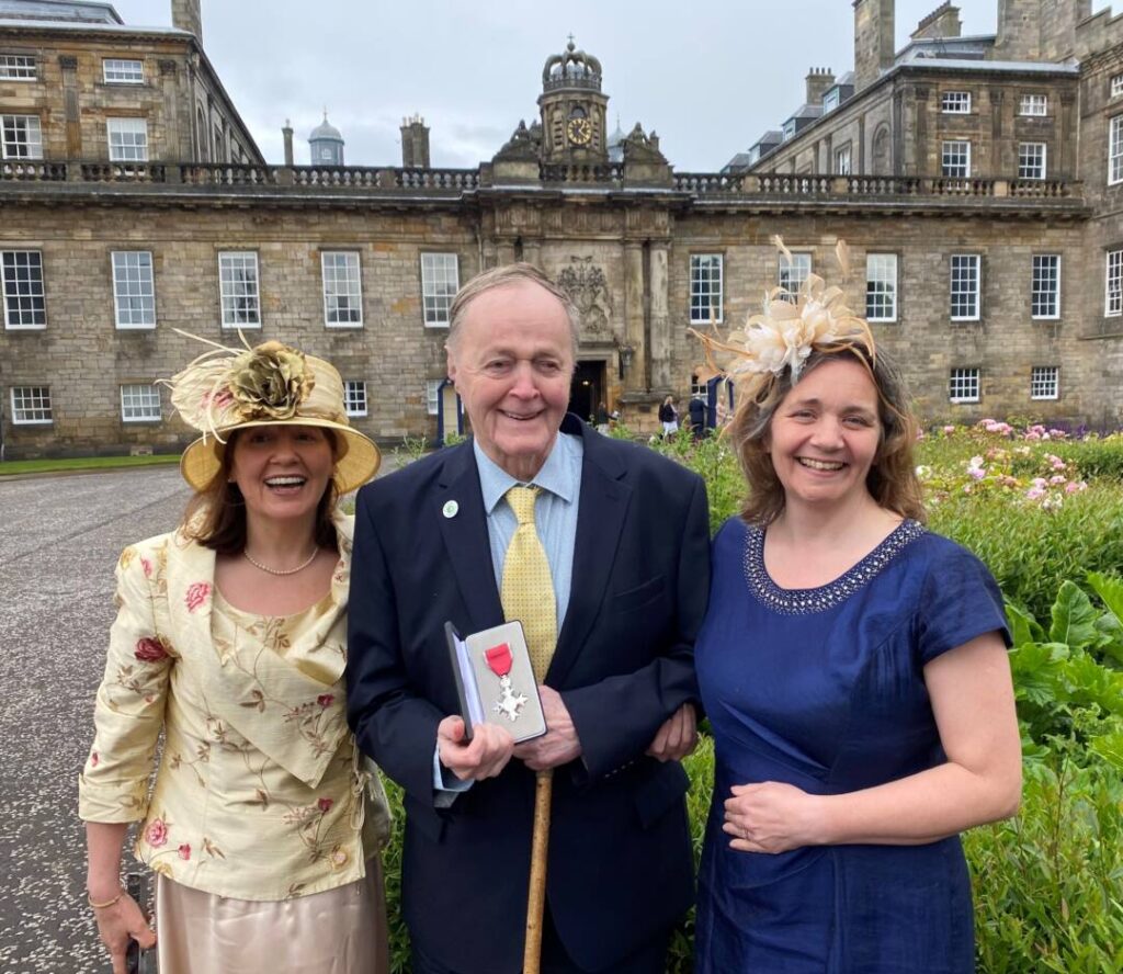 Andrew (centre) with daughters Lydia (left) and Elizabeth